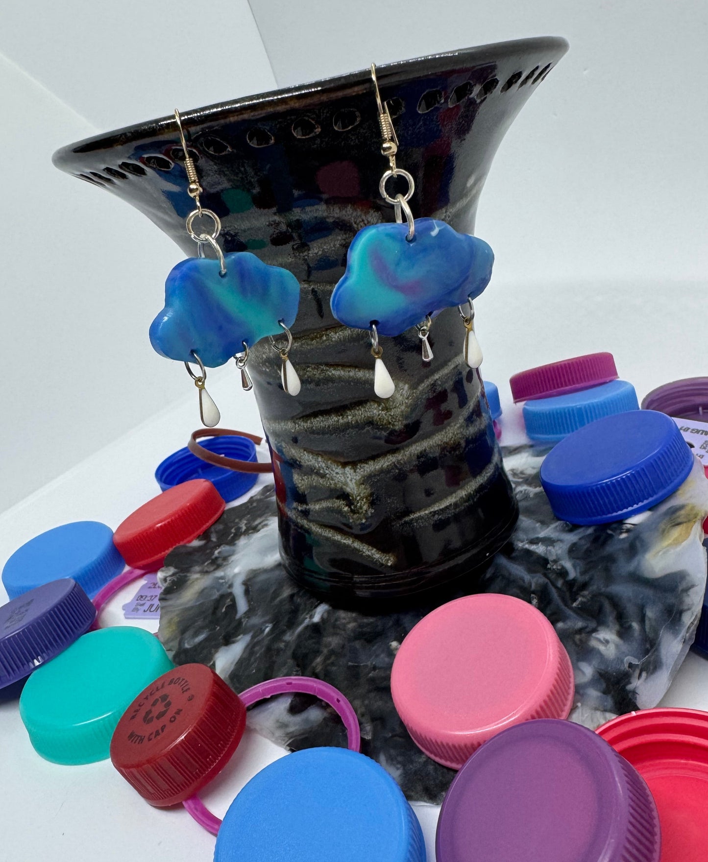 Colorful bottle caps on a white background