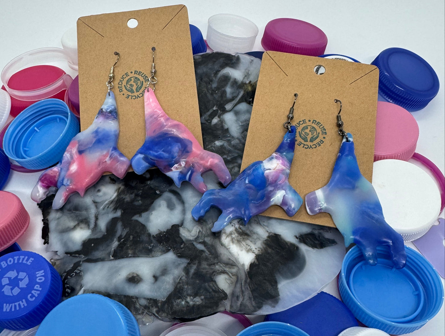 Colorful plastic bottle caps on a white background