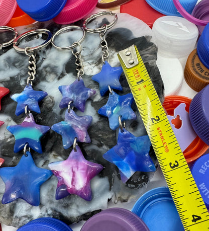 Colorful plastic bottle caps with a measuring tape on top